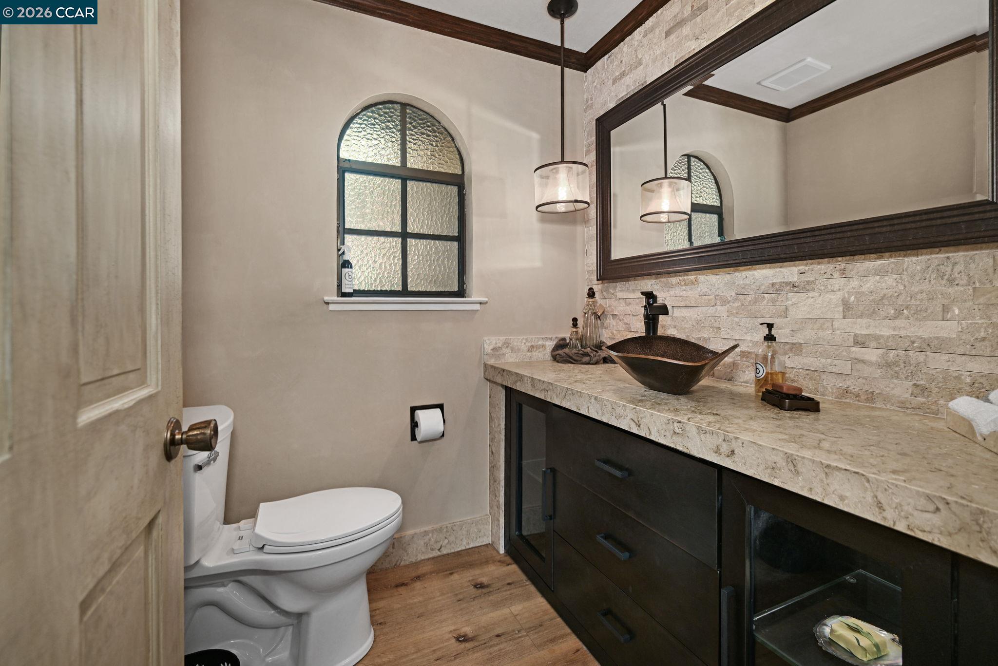 490 St Marys Road Lafayette, CA 94549 - Photo 16 of 61 a bathroom with a granite countertop toilet sink and mirror