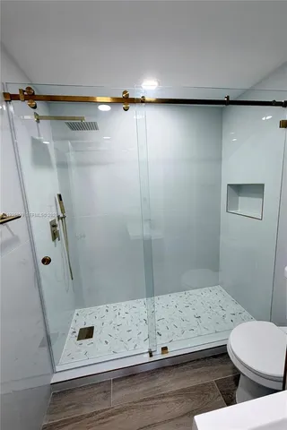 a bathroom with a sink and a shower
