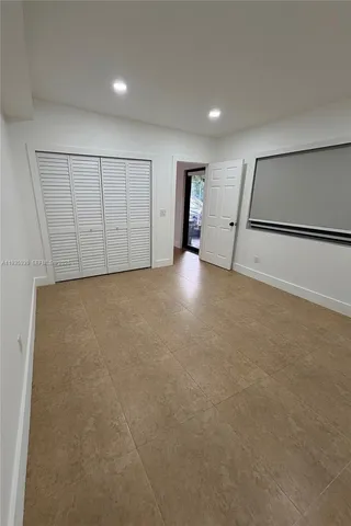 an empty room with closet