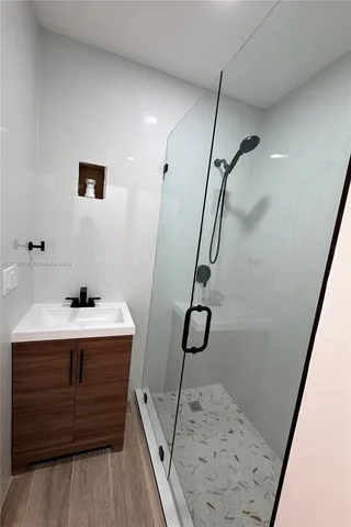 a bathroom with a sink and mirror
