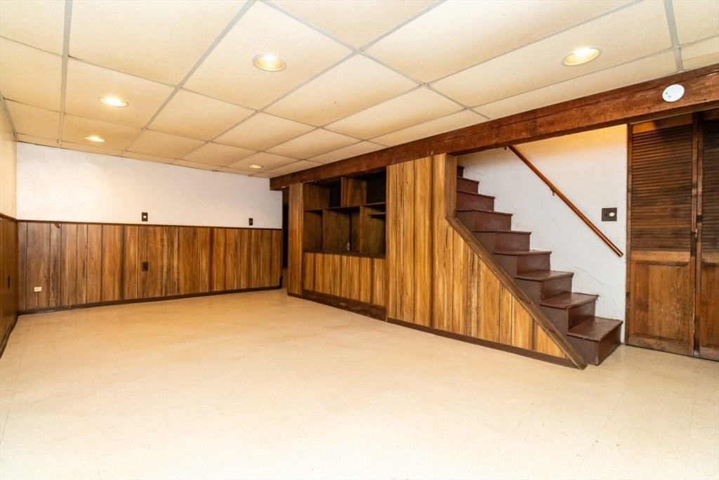 118 Bruce Road Walpole, MA 02081 - Photo 20 of 30 a view of an empty room with stairs