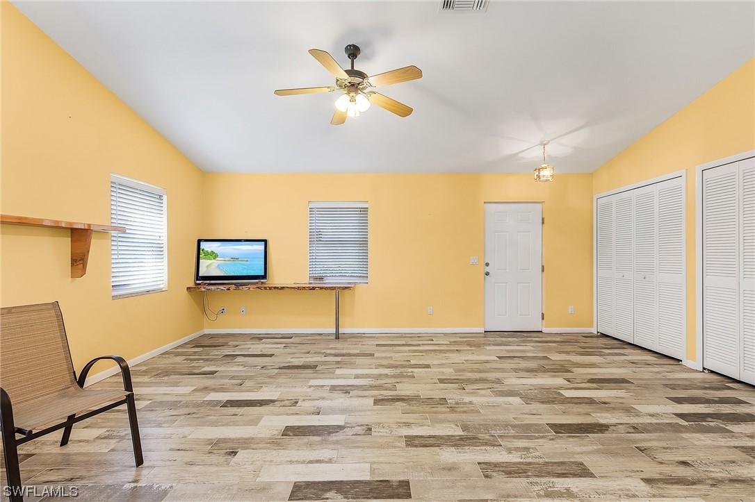 13673 Hampton Road Bokeelia, FL 33922 - Photo 9 of 28 a view of a livingroom with a workspace