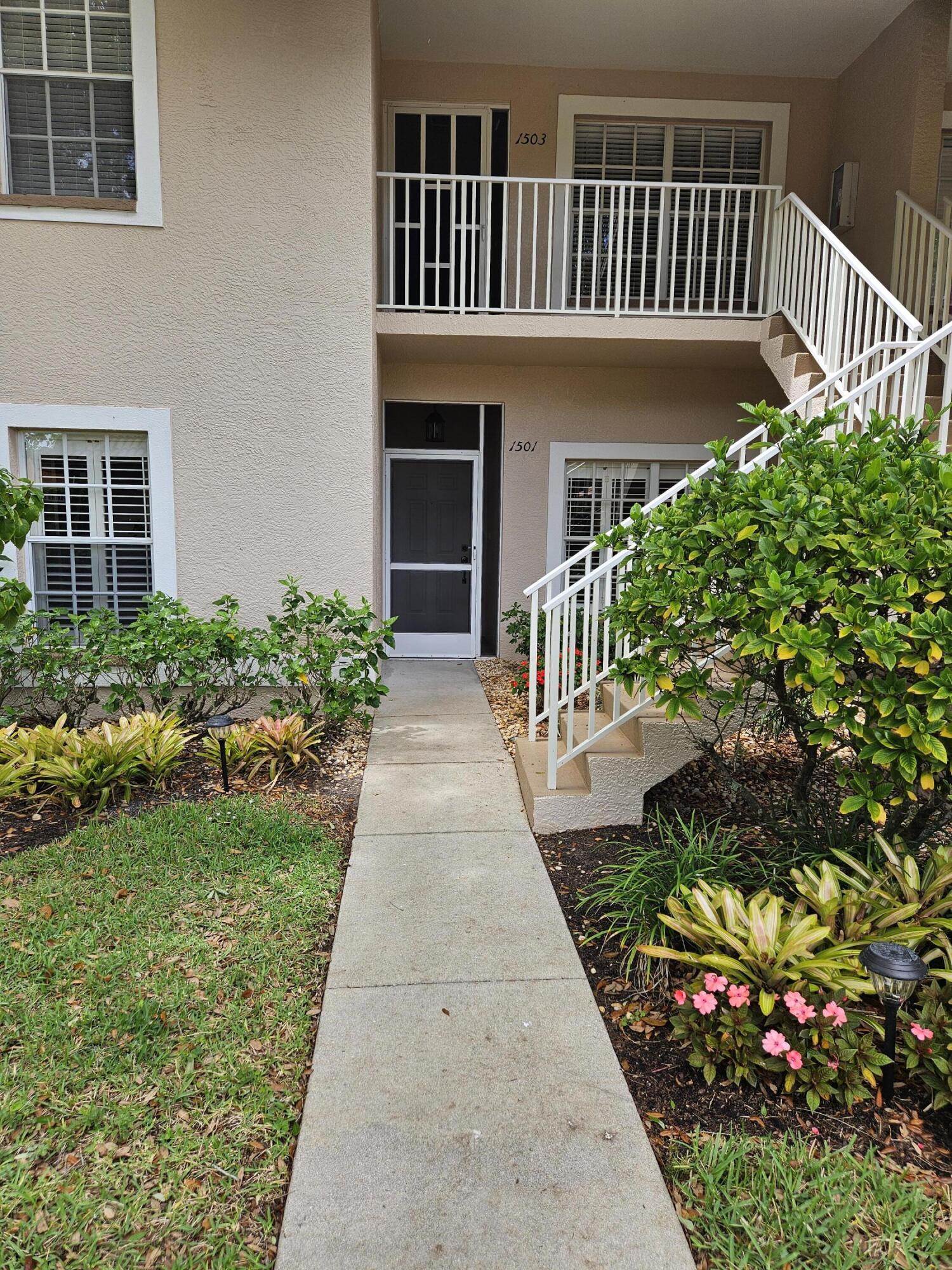 a house view with a garden space
