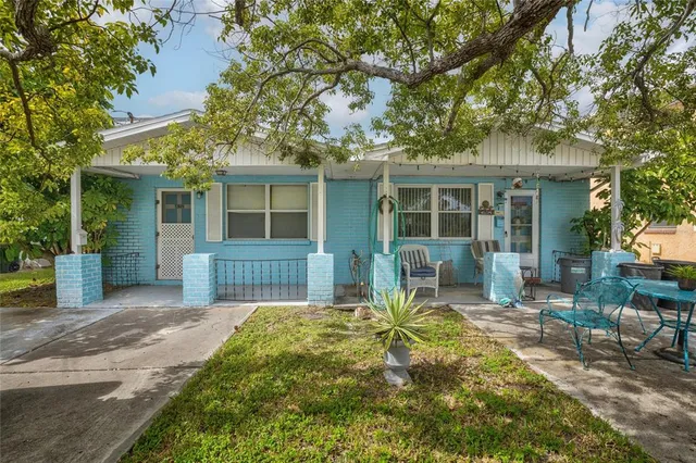 a house view with a garden space