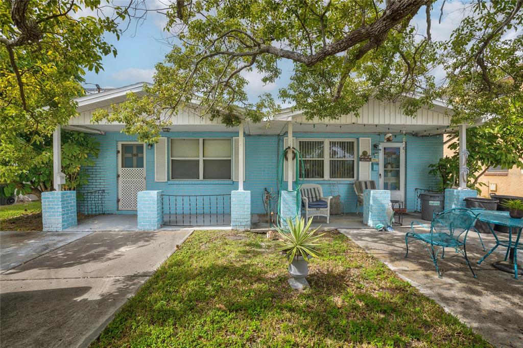 a house view with a garden space