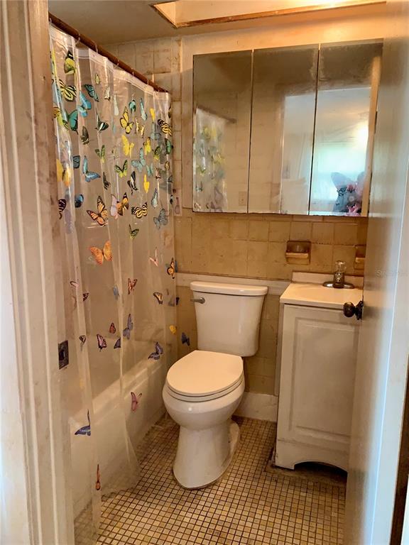 12629 1st Isle Hudson, FL 34667 - Photo 12 of 29 a bathroom with a toilet and a shower