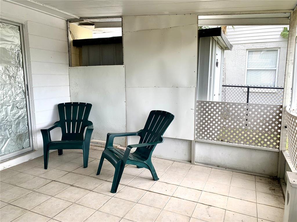 12629 1st Isle Hudson, FL 34667 - Photo 15 of 29 a view of kitchen with furniture and a potted plant