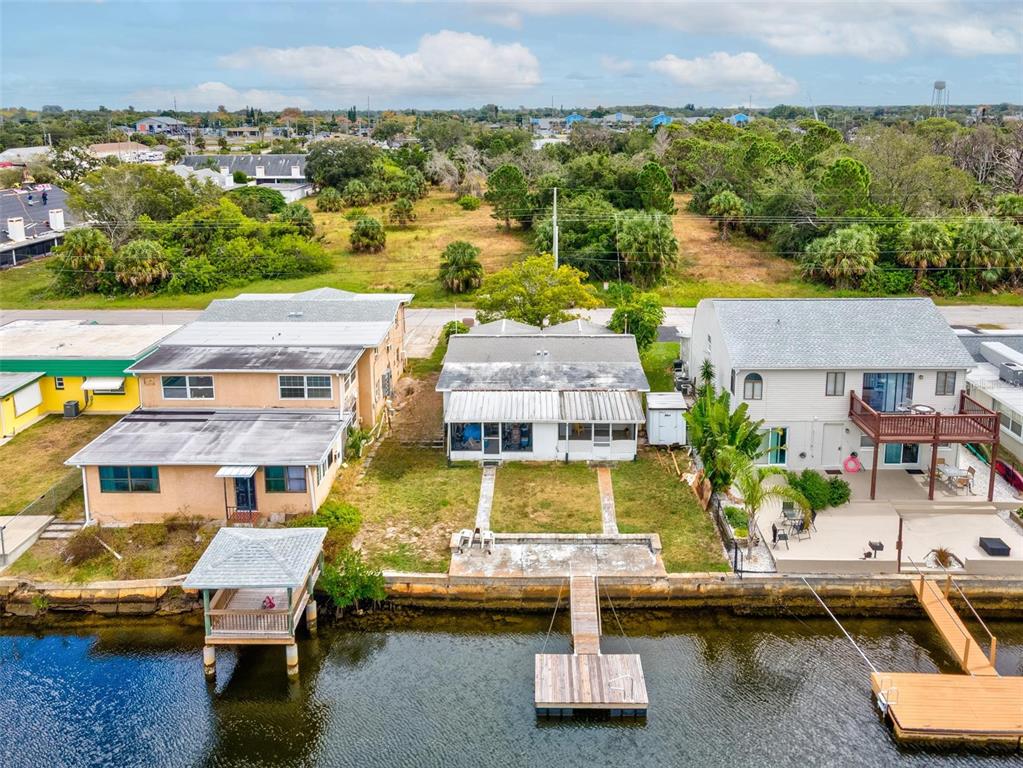 12629 1st Isle Hudson, FL 34667 - Photo 22 of 29 an aerial view of residential houses with outdoor space and swimming pool