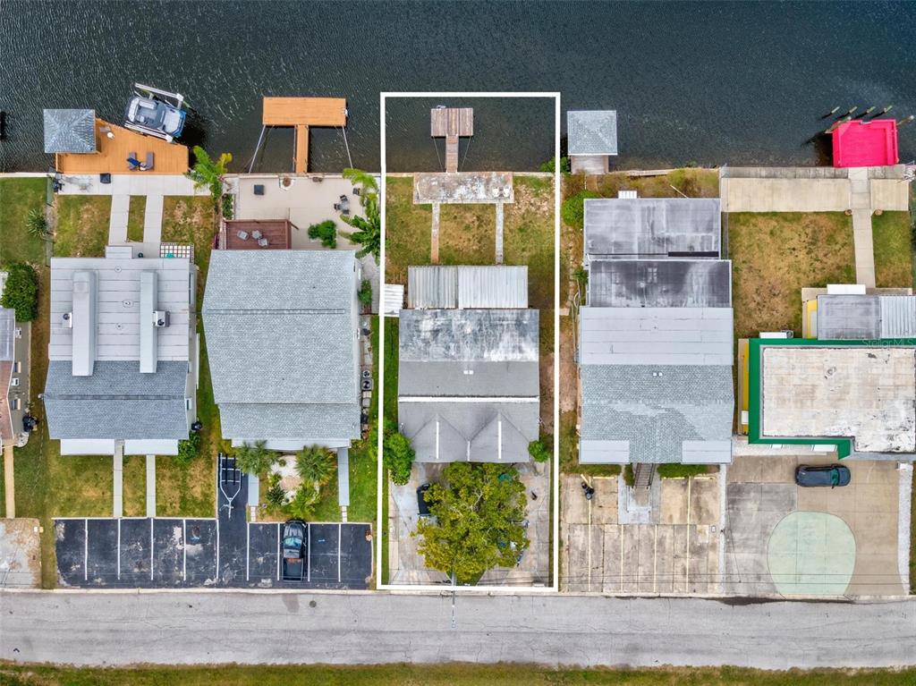 12629 1st Isle Hudson, FL 34667 - Photo 28 of 29 a aerial view of multi story residential apartment building with yard