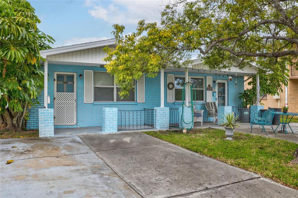 12629 1st Isle Hudson, FL 34667 - Photo 6 of 29 front view of a house with a yard