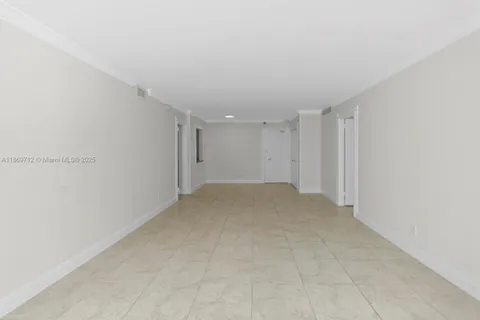 a front view of a building with a lot of windows