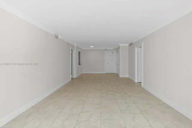 a front view of a building with a lot of windows