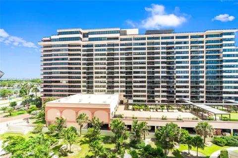 a view of a garden from a balcony