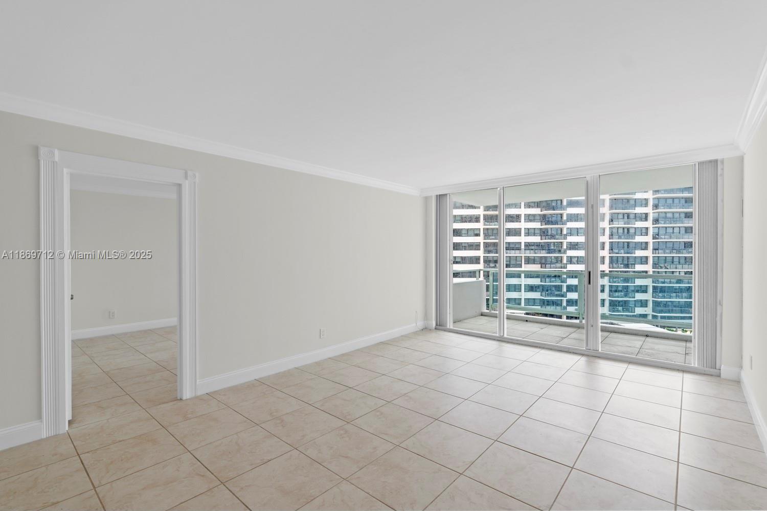 5161 Collins Avenue, Unit 701 Miami Beach, FL 33140 - Photo 8 of 47 a view of an empty room with a window
