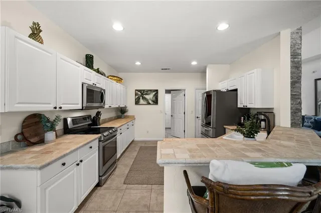 $999,500 | 6996 Burnt Sienna Circle, Naples, FL 34109