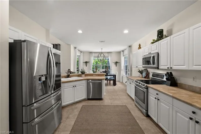 $999,500 | 6996 Burnt Sienna Circle, Naples, FL 34109