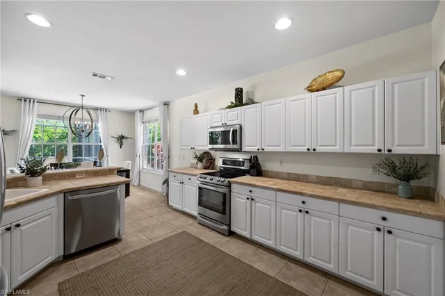 $999,500 | 6996 Burnt Sienna Circle, Naples, FL 34109