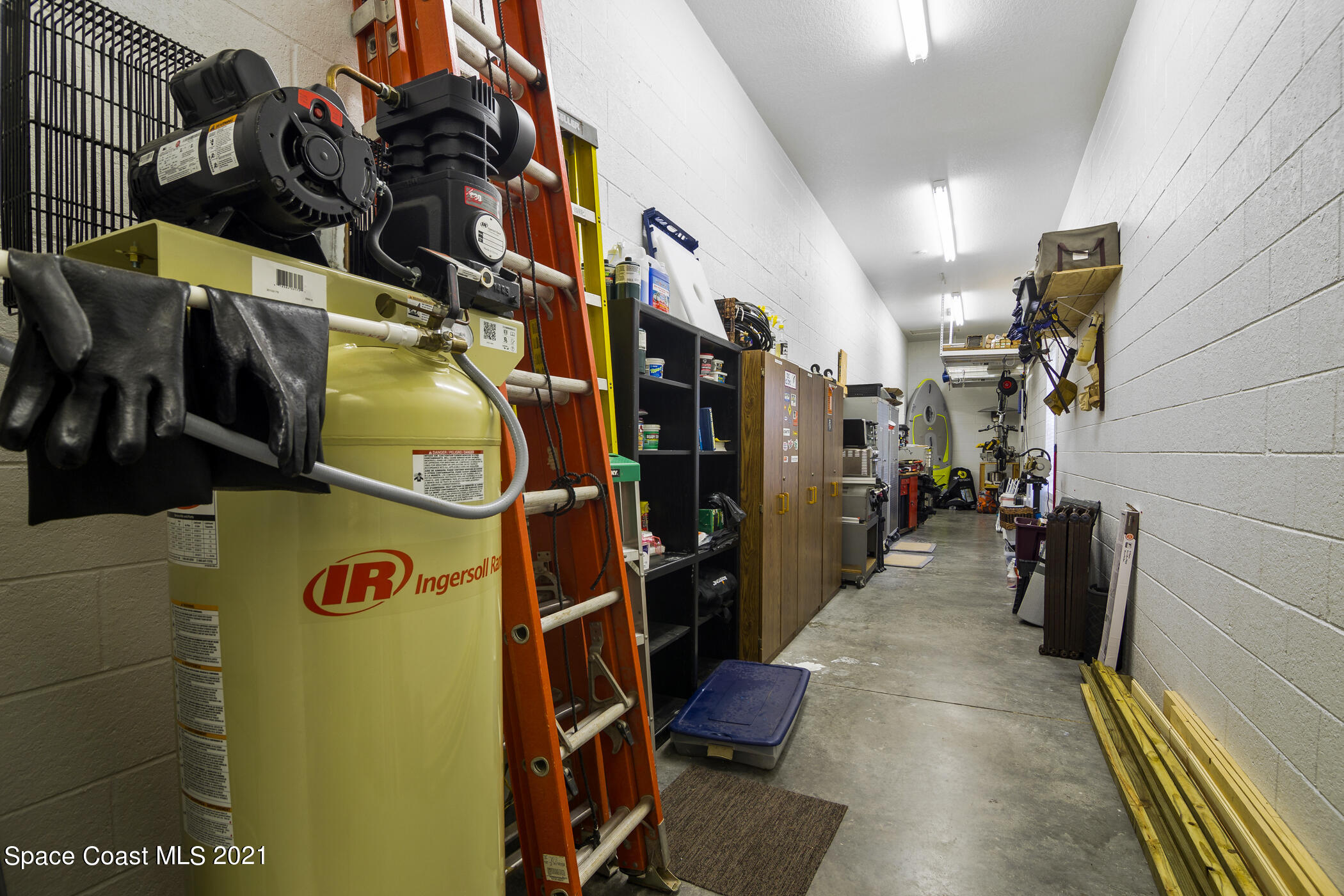 185 City Point Road Cocoa, FL 32926 - Photo 61 of 72 Expansive Garage Storage