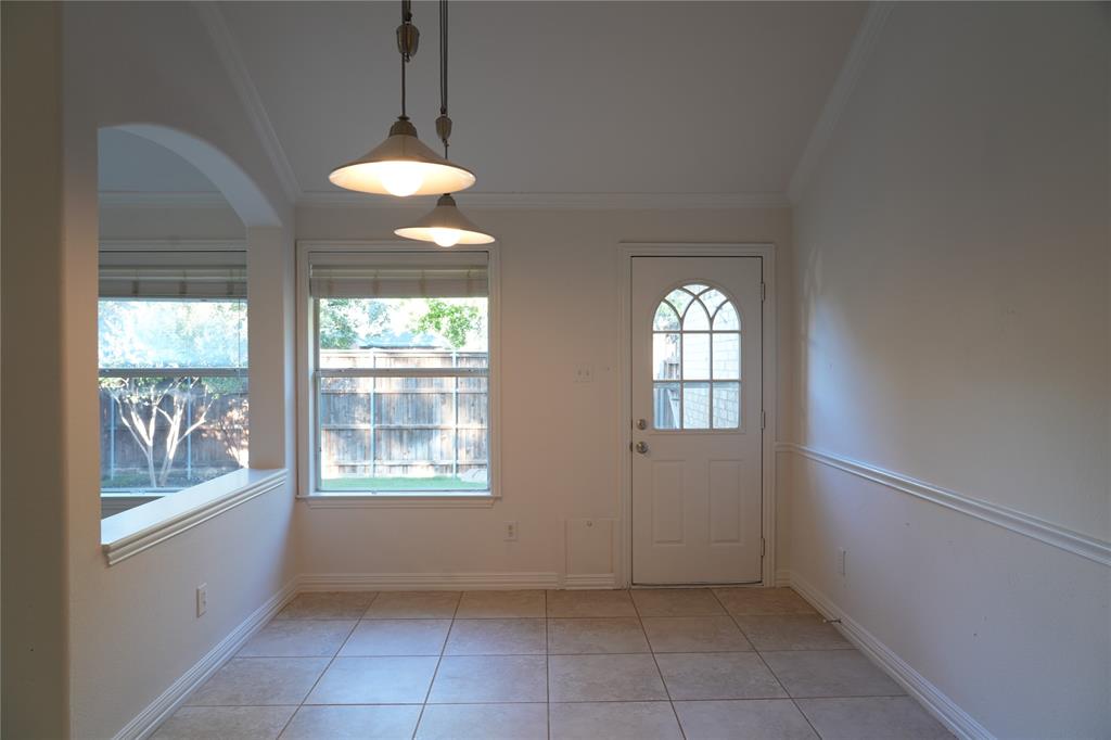 6437 Landmark Trail The Colony, TX 75056 - Photo 12 of 17 a view of an empty room with a window