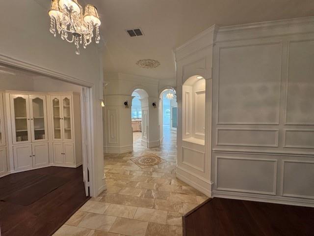 6437 Landmark Trail The Colony, TX 75056 - Photo 2 of 17 a view of a hallway with entryway windows and dinning room