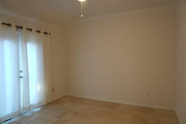 an empty room with a fireplace