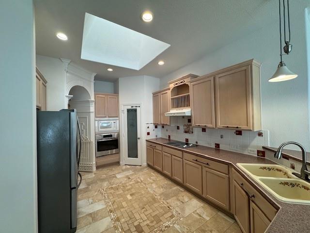 6437 Landmark Trail The Colony, TX 75056 - Photo 9 of 17 a large kitchen with a sink and stainless steel appliances