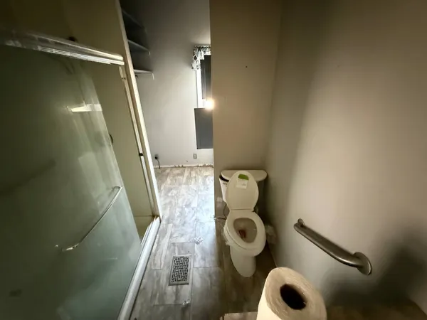 a bathroom with a sink and toilet