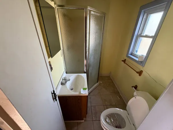 a bathroom with a sink and toilet