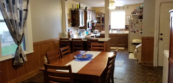 a view of a dining room with furniture