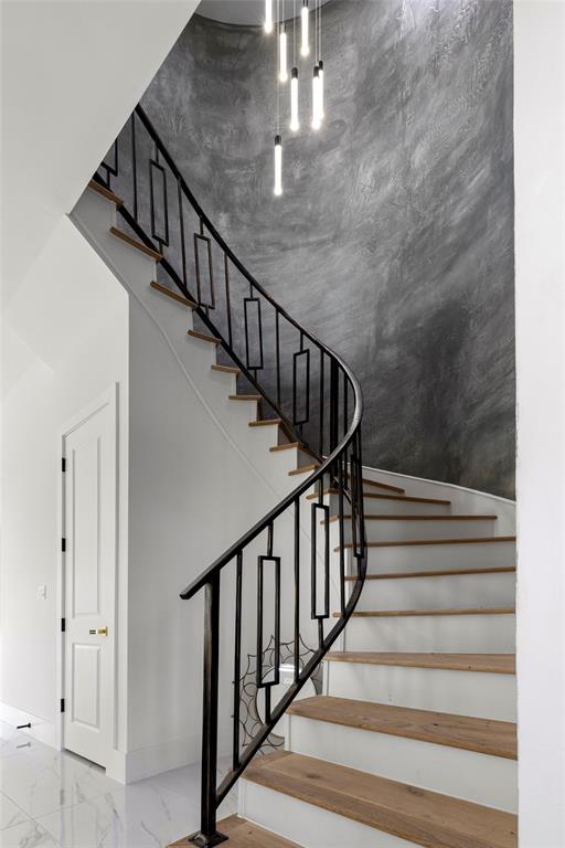 1022 Bow Street Rockwall, TX 75087 - Photo 9 of 40 Unique Staircase with ornate light fixture