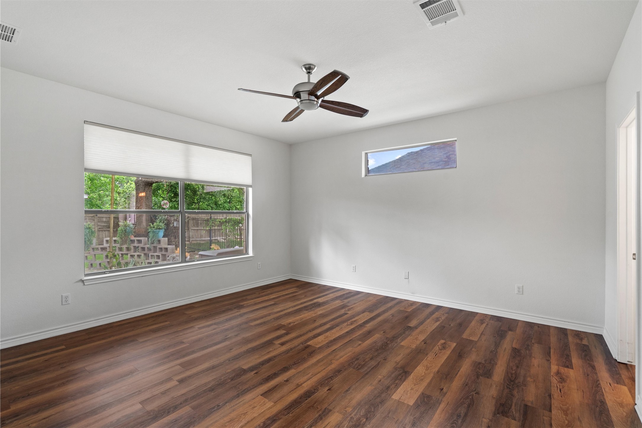 4612 Sonora Trace Georgetown, TX 78633 - Photo 25 of 36 wooden floor in an empty room with a window