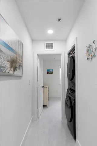 a view of a storage & utility room with closet