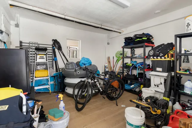 a swimming pool with outdoor seating and yard