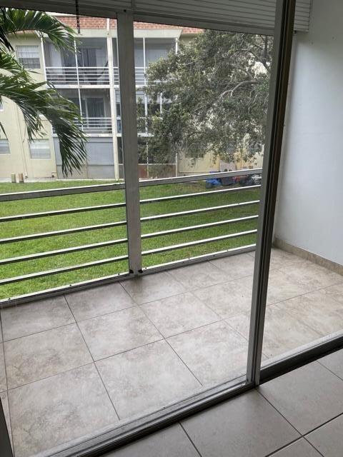 5501 Northwest 2nd Avenue, Unit 211 Boca Raton, FL 33487 - Photo 6 of 14 Screened Patio