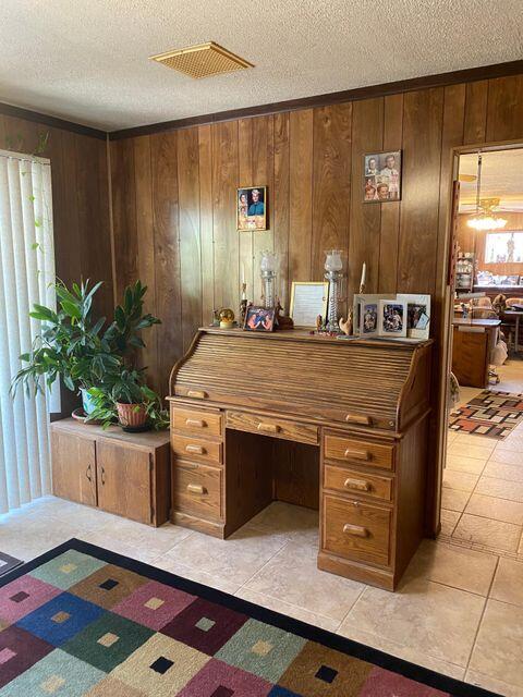 25650 Kaiser Road Desert Center, CA 92239 - Photo 11 of 44 a room with kitchen island a potted plant a sink and a large window