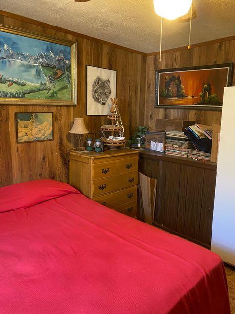 25650 Kaiser Road Desert Center, CA 92239 - Photo 15 of 44 a kitchen with stainless steel appliances kitchen island granite countertop a stove a sink and a microwave