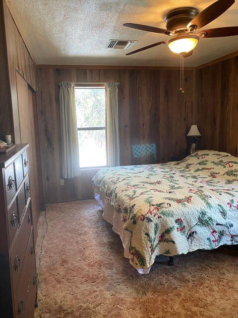 25650 Kaiser Road Desert Center, CA 92239 - Photo 18 of 44 a bedroom with a bed next to a window