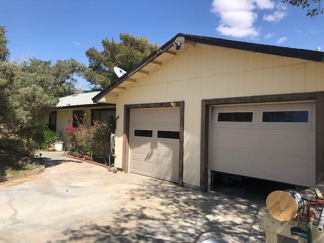 25650 Kaiser Road Desert Center, CA 92239 - Photo 2 of 44 a front view of a house with a yard