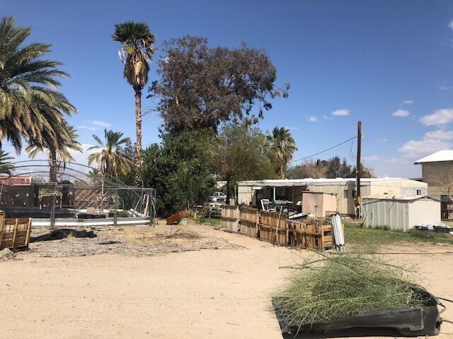 25650 Kaiser Road Desert Center, CA 92239 - Photo 21 of 44 a view of a swimming pool with a patio
