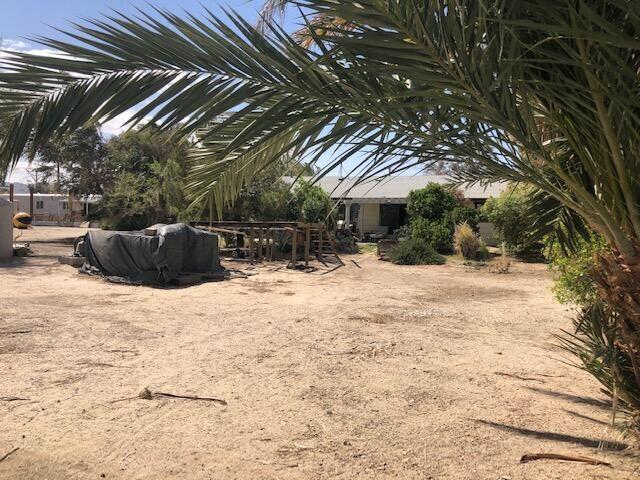 25650 Kaiser Road Desert Center, CA 92239 - Photo 29 of 44 a view of the backyard of a house