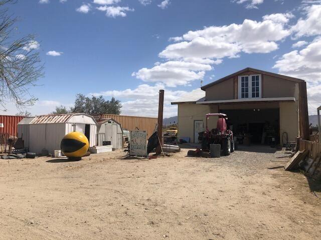 25650 Kaiser Road Desert Center, CA 92239 - Photo 3 of 44 a view of a bike parked in the yard