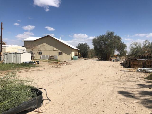 25650 Kaiser Road Desert Center, CA 92239 - Photo 6 of 44 a view of a house with snow on the road