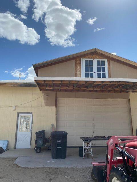 25650 Kaiser Road Desert Center, CA 92239 - Photo 7 of 44 a car parked in front of a building