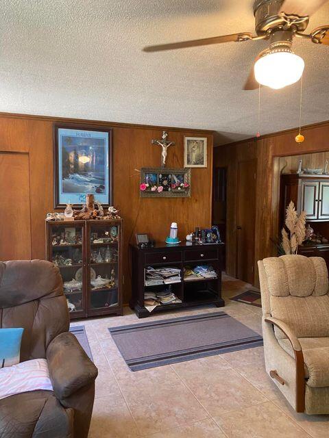 25650 Kaiser Road Desert Center, CA 92239 - Photo 8 of 44 a living room with furniture and a flat screen tv
