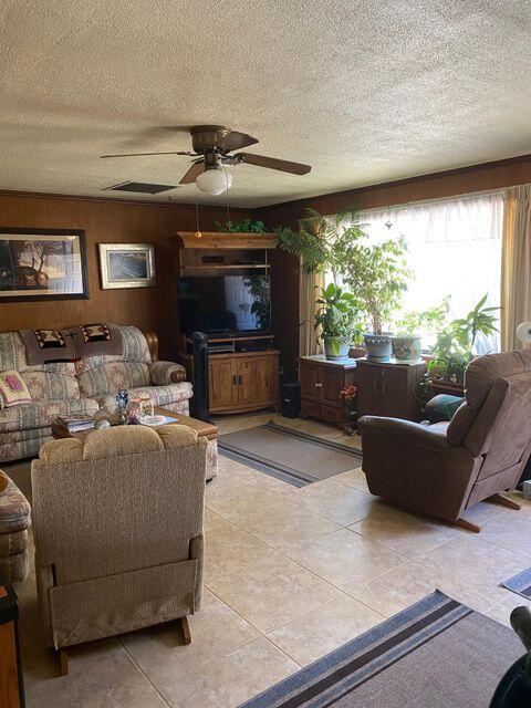 25650 Kaiser Road Desert Center, CA 92239 - Photo 10 of 44 a living room with furniture and a large window