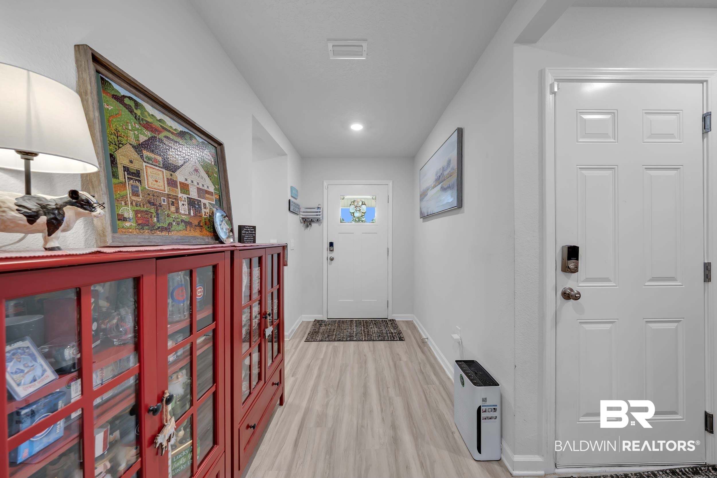 24271 Ringneck Loop Elberta, AL 36530 - Photo 8 of 44 Entryway featuring light wood-finish flooring, white walls, recessed ceiling lighting, and a white paneled door with a glass insert