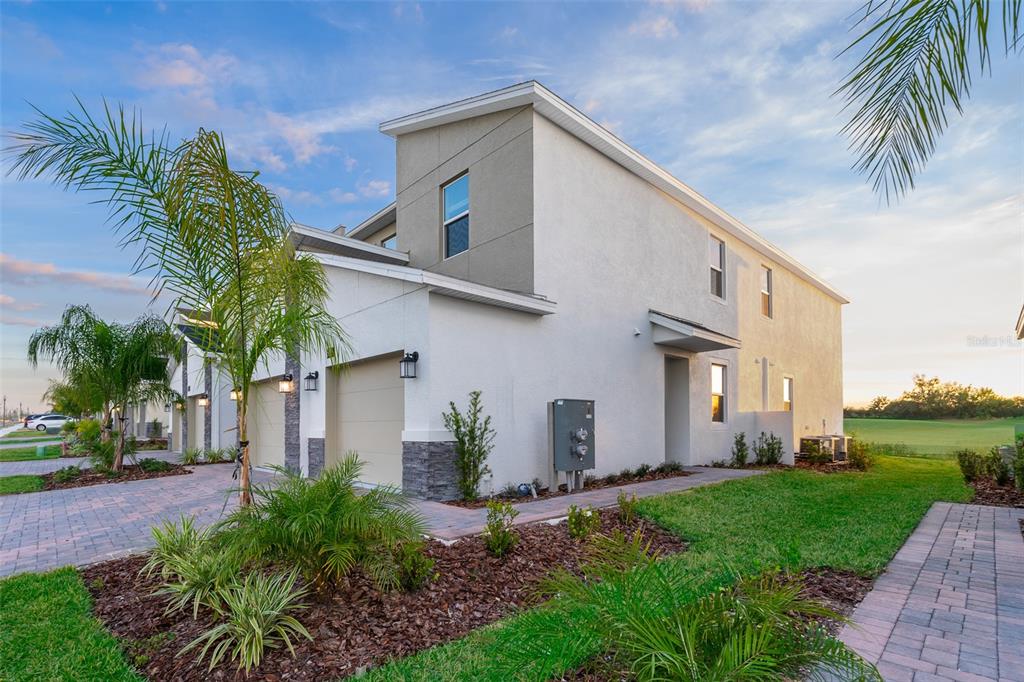 817 Ocean Course Avenue Davenport, FL 33896 - Photo 20 of 32 a house view with a garden space
