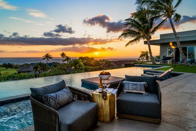 a view of sitting area with furniture and lake view