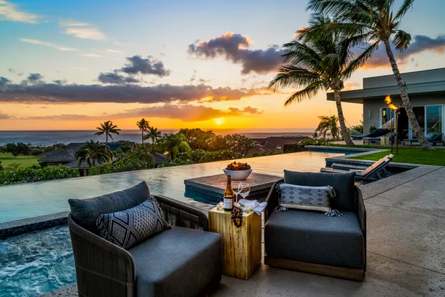 a view of sitting area with furniture and lake view