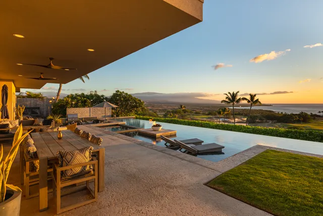 a bedroom with a bed and a flat tv screen